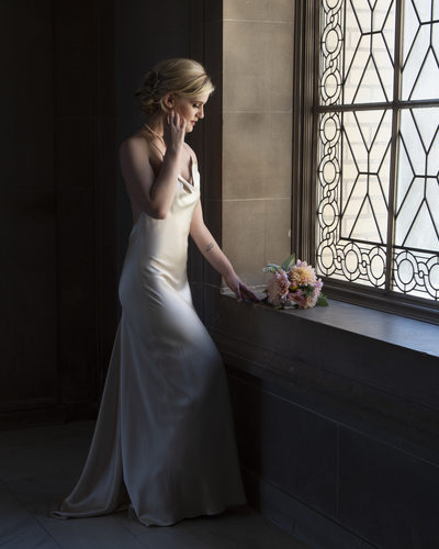 San Francisco City Hall Wedding Photographer - Evening Window of beautiful bride