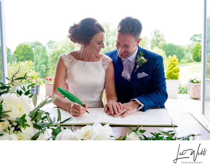 Signing Wedding Register Photos