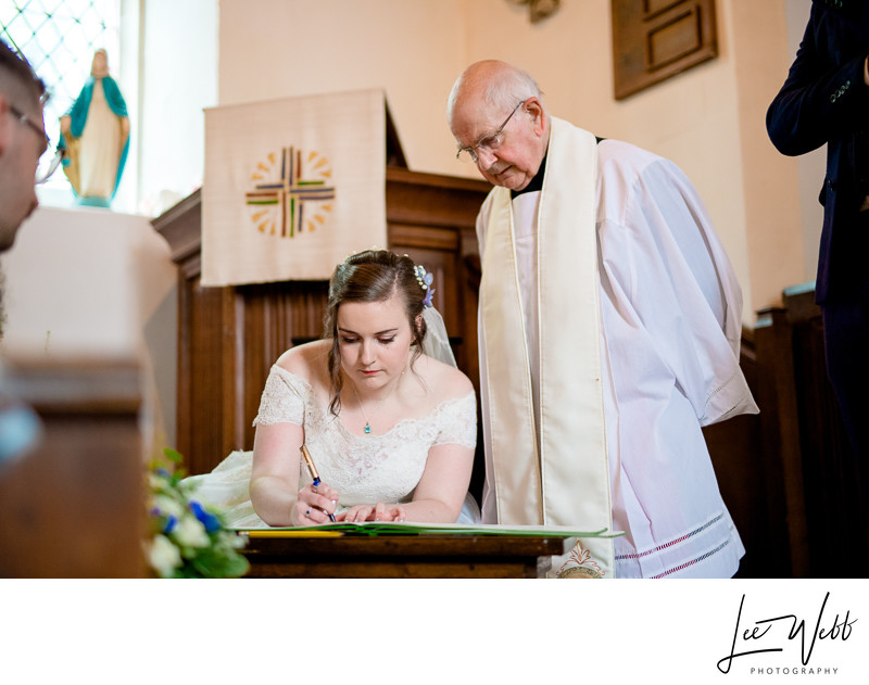 Signing Register in Church Photos