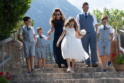 The perfect family walking down the stairs in Malcesine