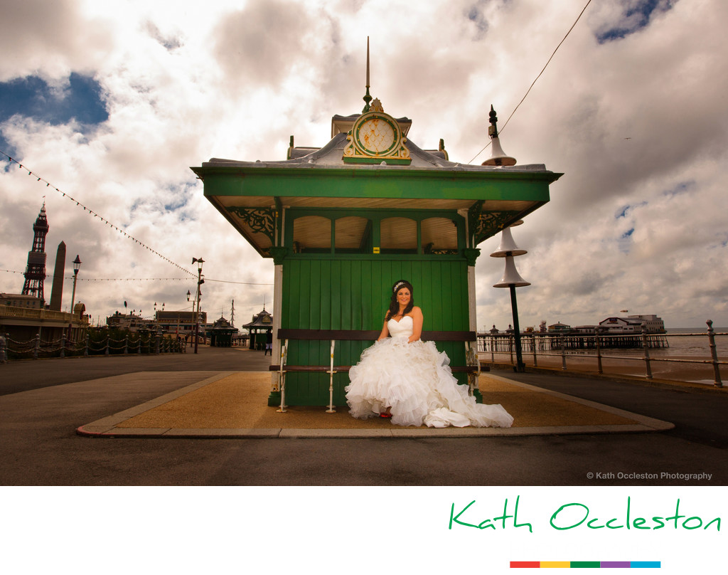 Bride in green shelter on Blackpool Promenade