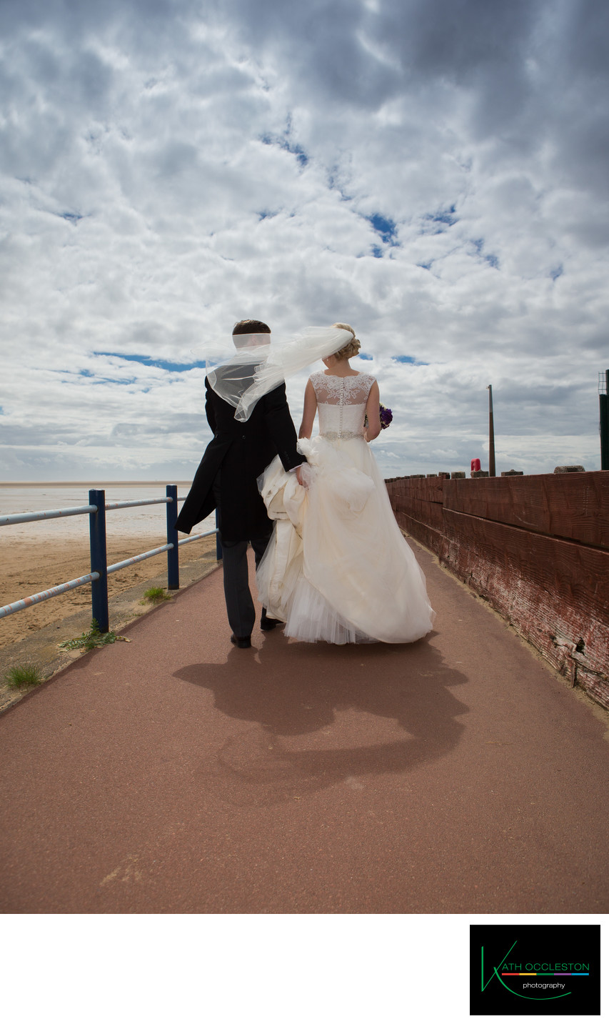 Windy wedding day photography in St Annes on Sea