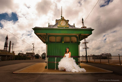 Bride in green shelter on Blackpool Promenade