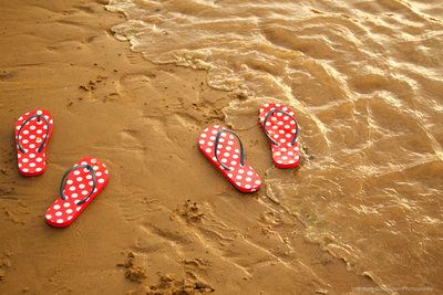Wedding flip flops on the beach