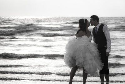 Bride & Groom at the edge of the sea