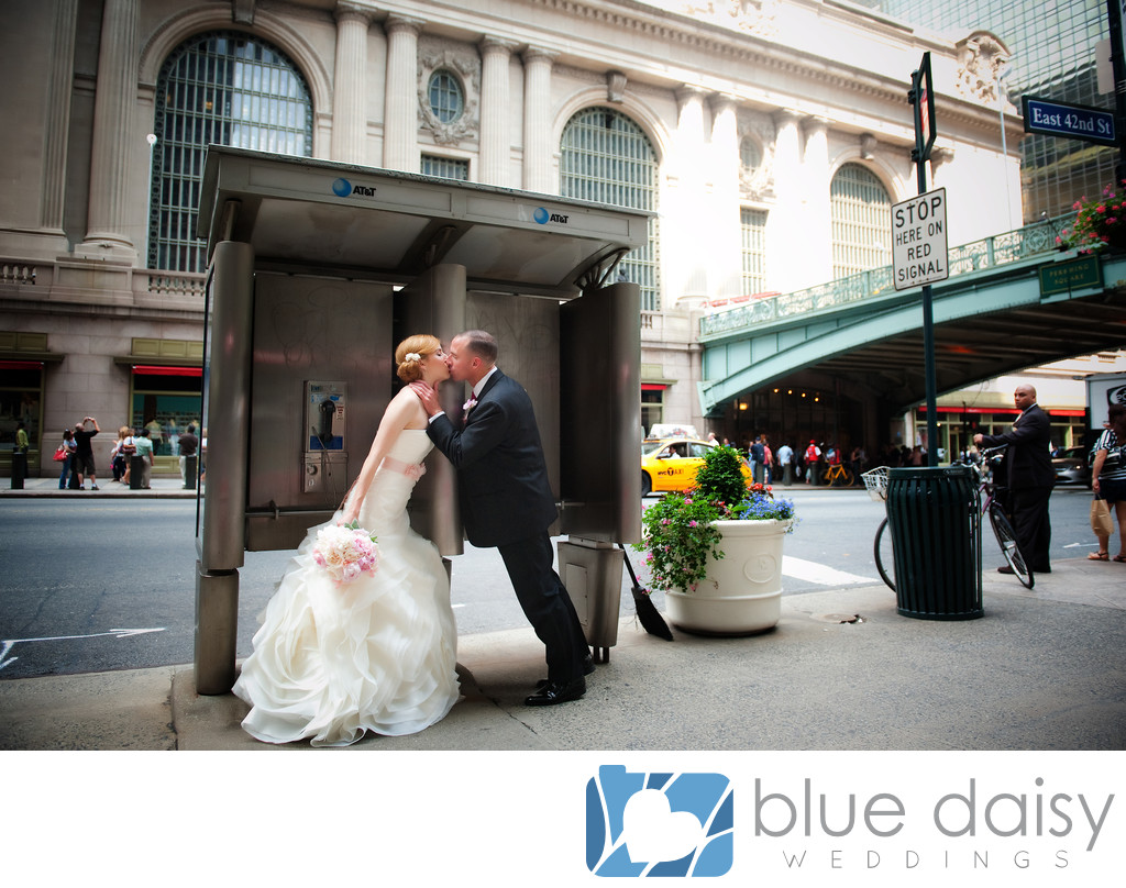 Wedding couple kissing front of Grand Central Terminal