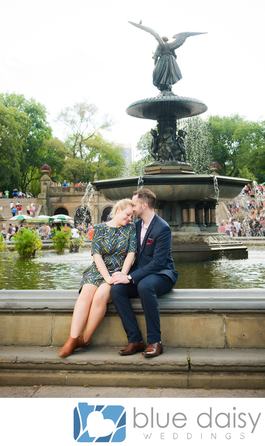 Couple sitting on Bethesda fountain under the angel