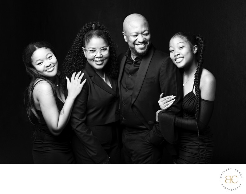 Elegant Family in Monochrome Attire Elegant Family in Monochrome Attire