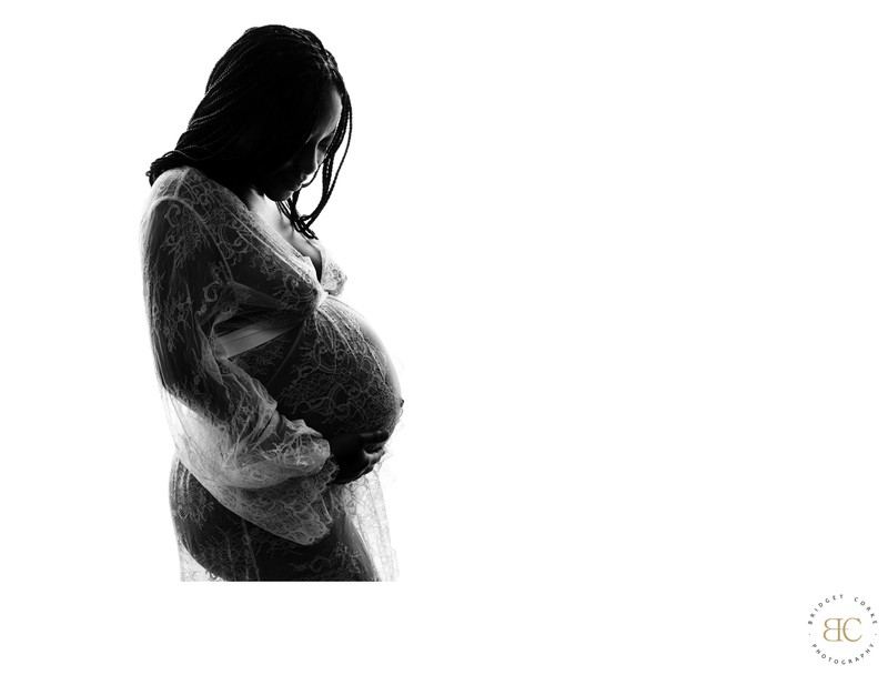 Silhouetted Maternity Portrait in Lace Robe Silhouetted Maternity Portrait in Lace Robe