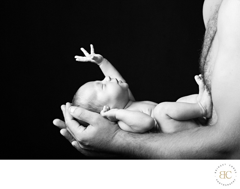Father's Care: Holding Newborn with Love Father's Care: Holding Newborn with Love