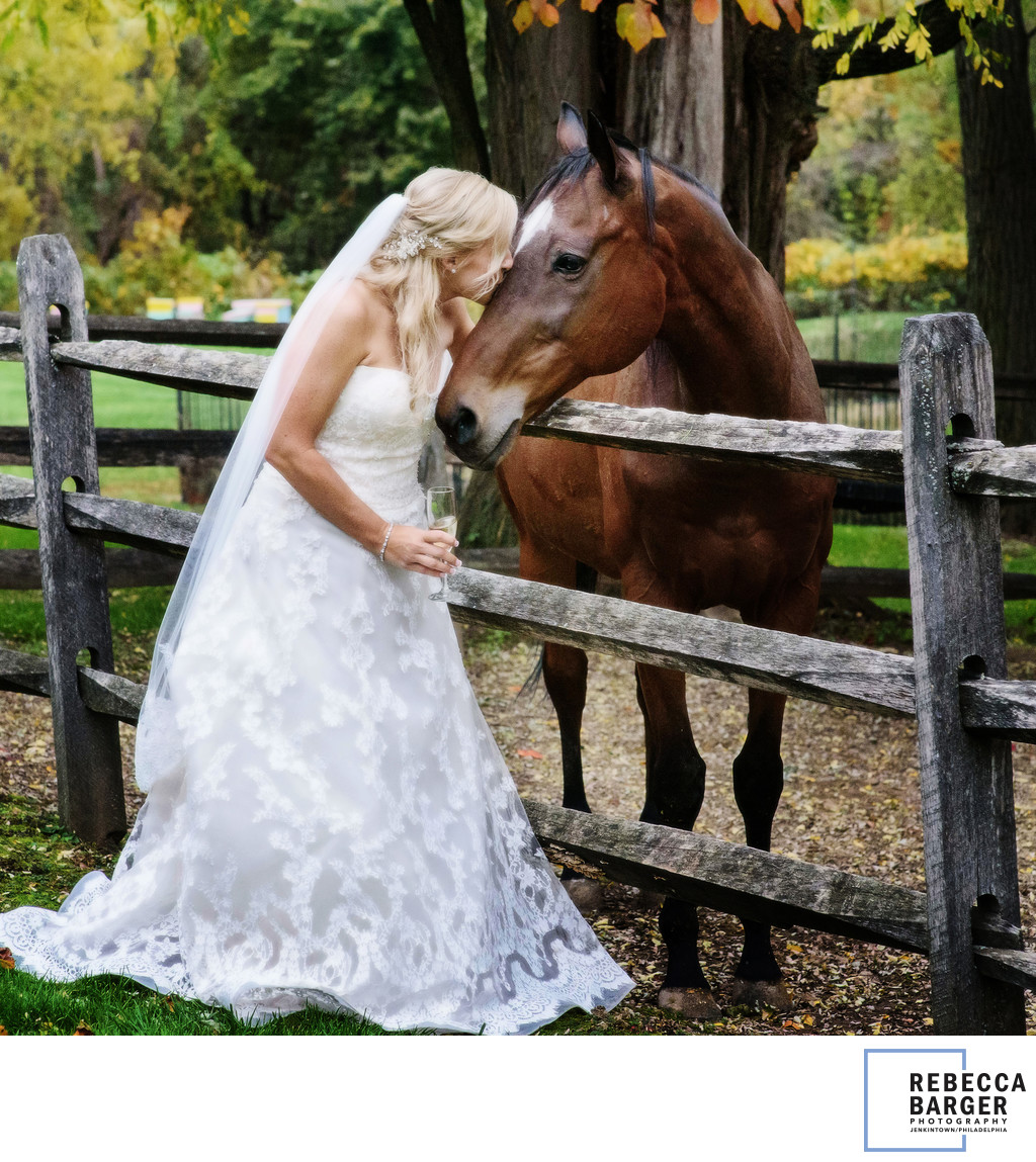 A few horsey kisses outside the barn, on wedding day. 