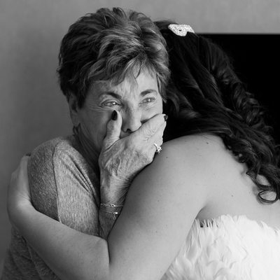 Grandma's tears as she first sees her granddaughter on her wedding day. 