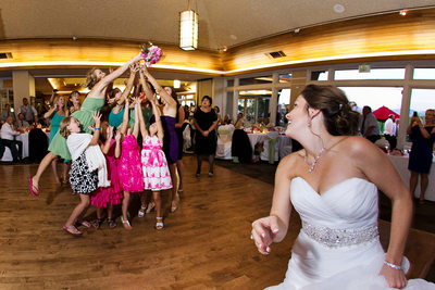 Wedding bouquet toss at Cinnabar Hills Golf Club