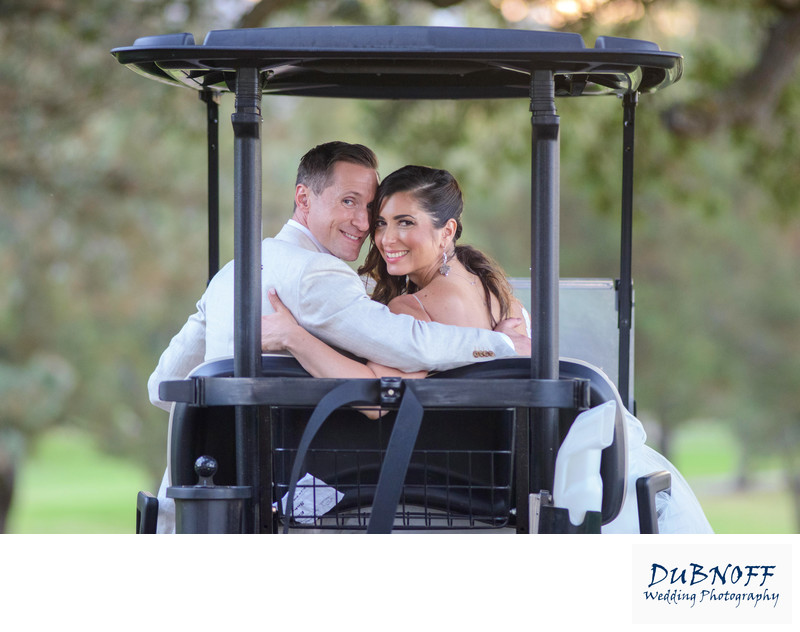 Boundary Oaks wedding - bride and groom in a Golf Cart
