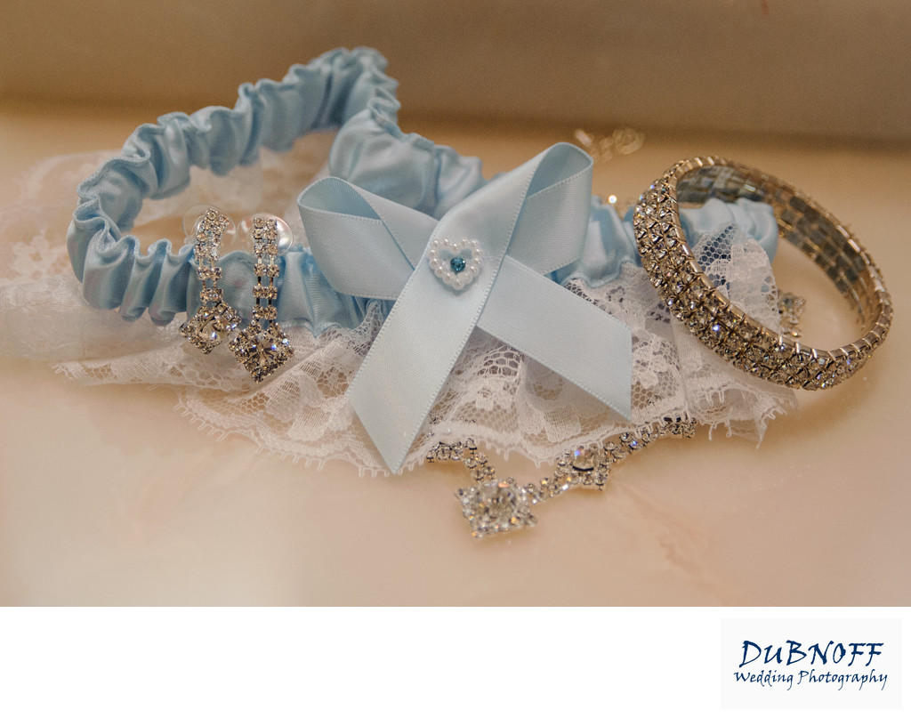 Wedding Details Image of Garter and Bride's Jewelry