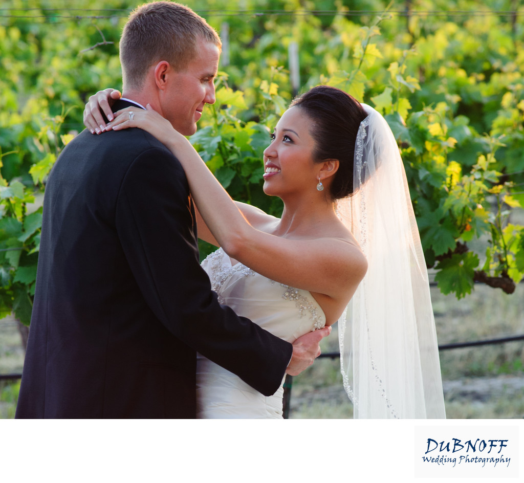 bride and groom in the vineyard at Casa Real in Livermore Valley