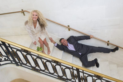 Fun San Francisco City Hall Wedding Photography on stairs