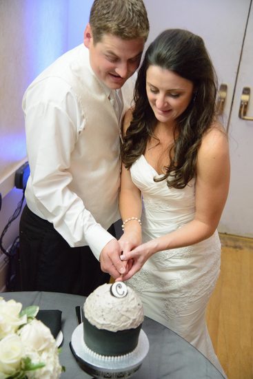 Bride and Groom Cut the Wedding Cake at SF Reception