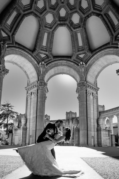 Groom Dips Bride at the Palace of Fine Arts in SF