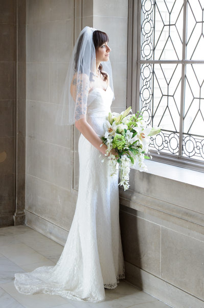 Beautiful Lesbian Bride Looking out SF City Hall Window