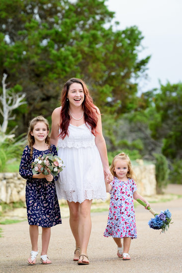 Chapel Dulcinea | Bride Walks Down Path with Daughters