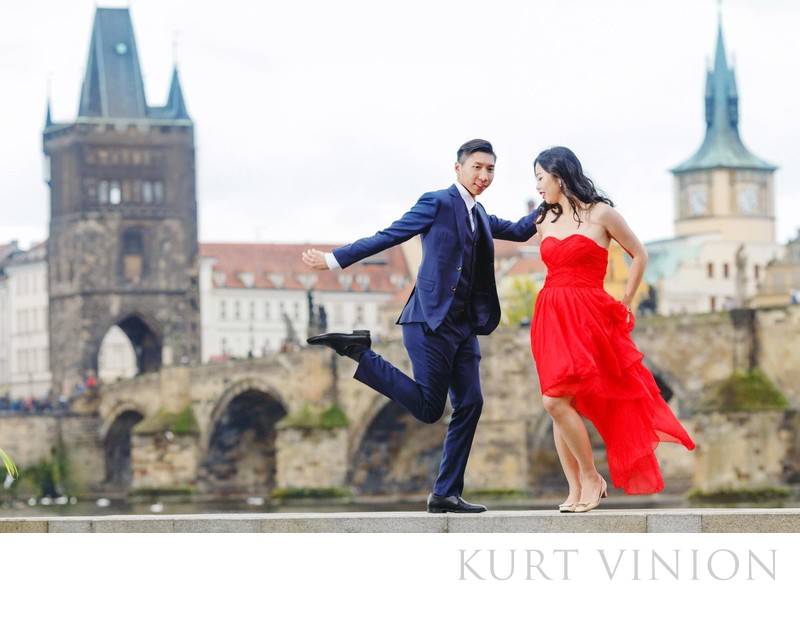 pre wedding photos Prague dancing near Charles Bridge
