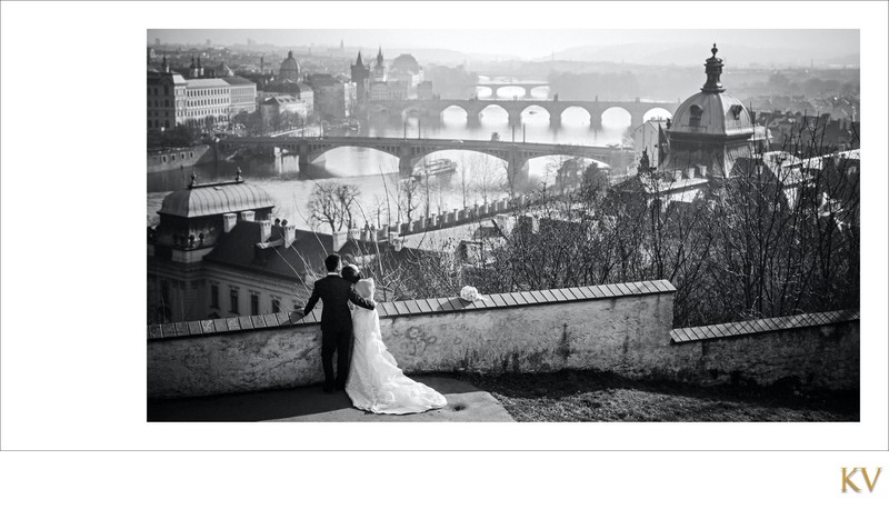 elegant b&w portrait  bride & groom overlooking Prague