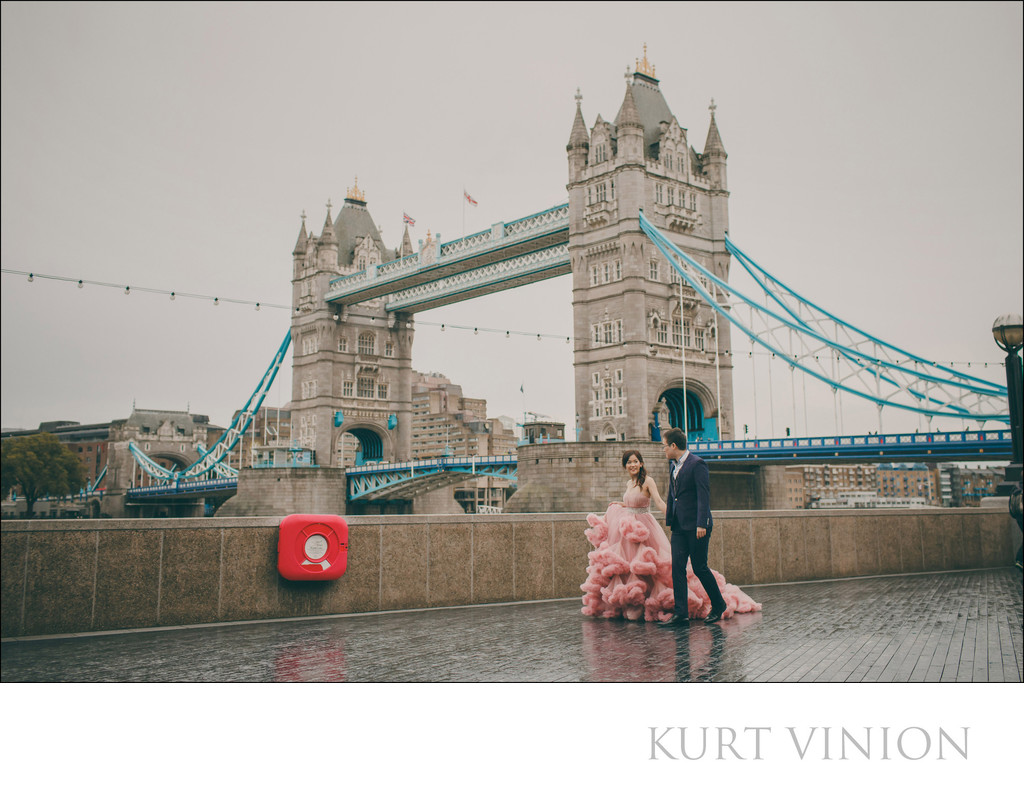 walking in the rain pink dress London Tower Bridge 
