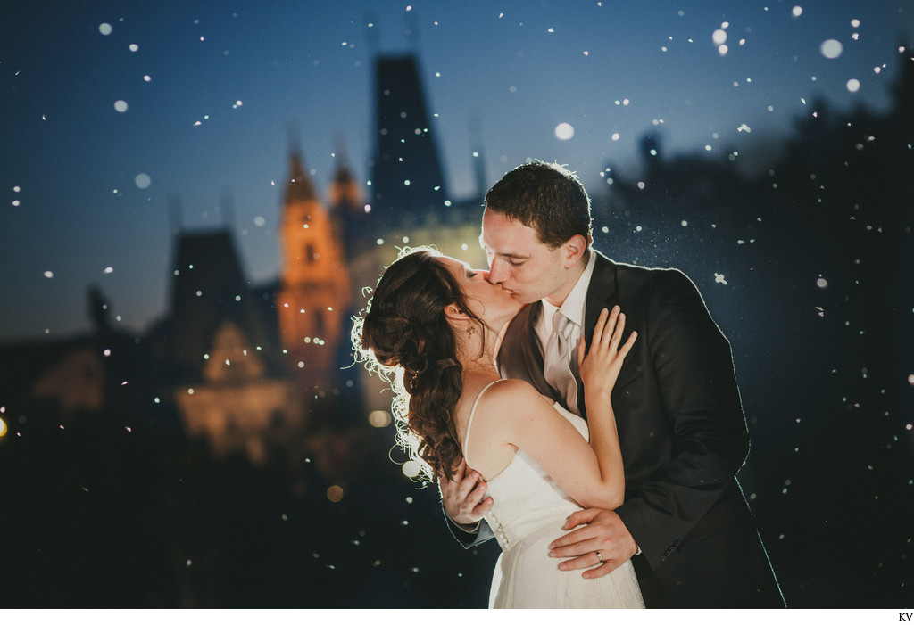 magical kiss of bride & groom Charles Bridge at night