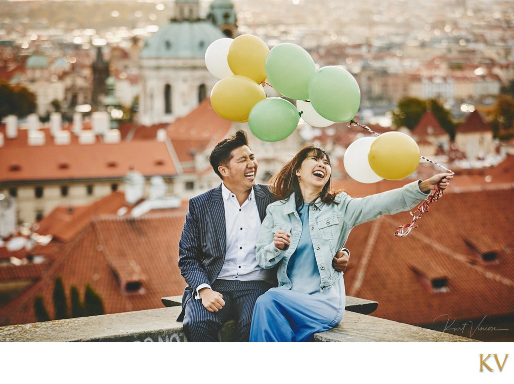 She said Yes! Celebrating their love above Prague!