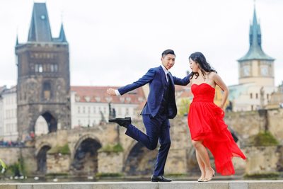 pre wedding photos Prague dancing near Charles Bridge
