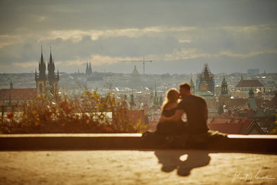 silhouetted against the Prague skyline C&M