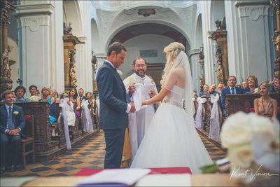 Priest bride & groom St. Thomas church weddings Prague