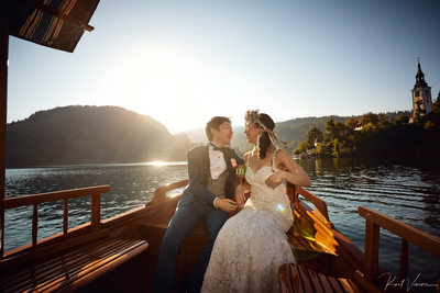 wedding couple enjoying boat ride Lake Bled