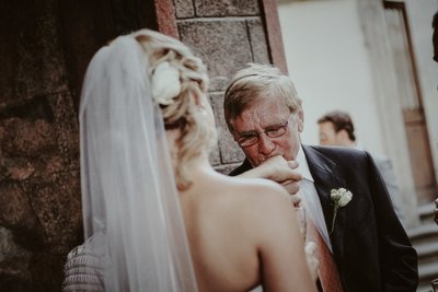 Father kissing his daughters hand