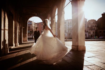 bride spinning in her wedding gown Venice, Italy 