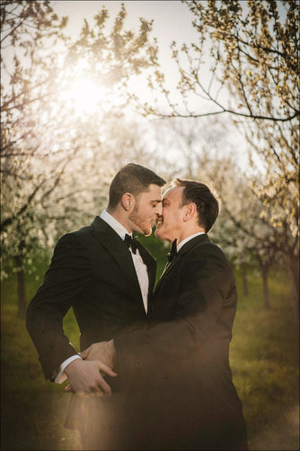 a sun flared kiss for these two gentlemen