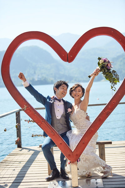 Lake Bled weddings I bridge & groom 'Heart of Bled'