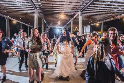 BARN WEDDING RECEPTION: DANCING BRIDE