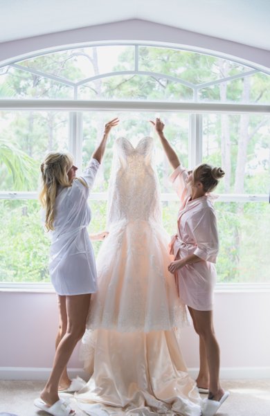 BRIDES WEDDING DRESS AND BALL GOWN