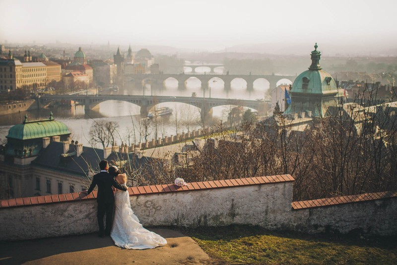 Prague weddings - bride & groom overlooking Prague
