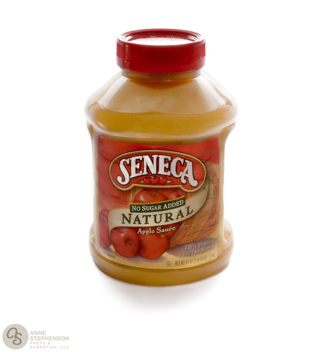 Jar of Seneca brand apple sauce on a white background