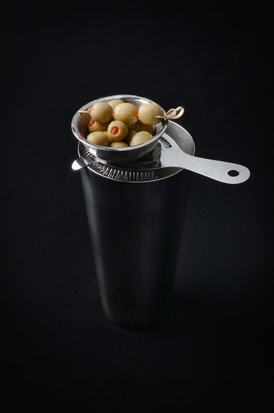 Cocktail Shaker with Green Olives on Top