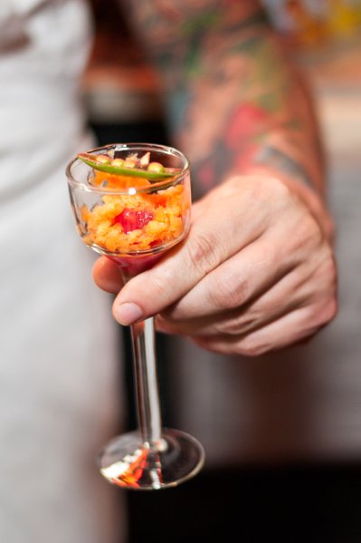 Artful chef with colorful appetizer