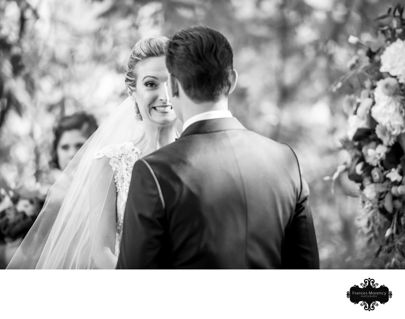 Bride Laughs During Ceremony:  Black and White Wedding