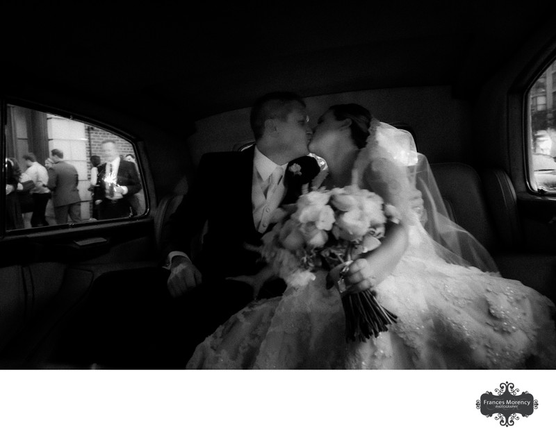 Bride Groom Kissing in Back of Car:  Toronto Wedding