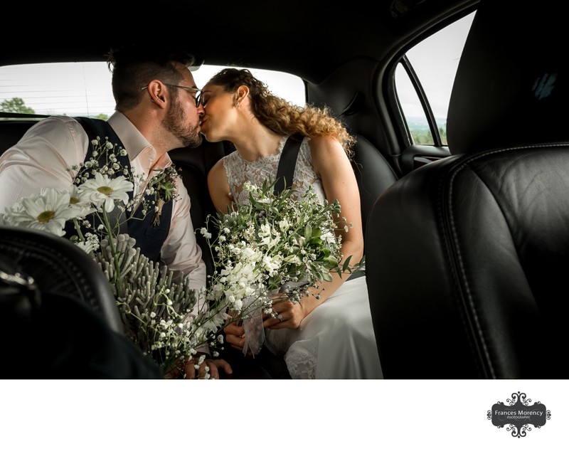 Bride Groom Kiss in Limo:  Thornbury Photographer