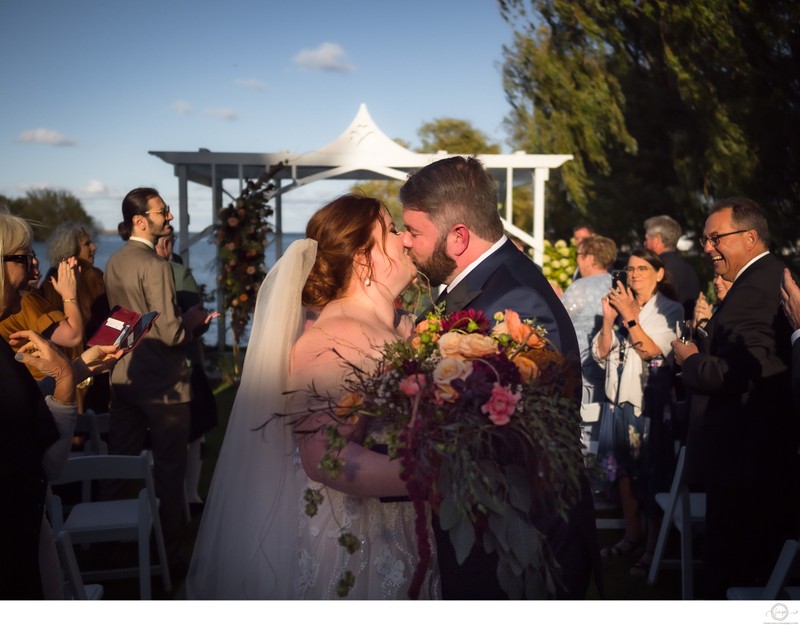 Kiss During Ceremony Exit:  Collingwood Wedding Photographer