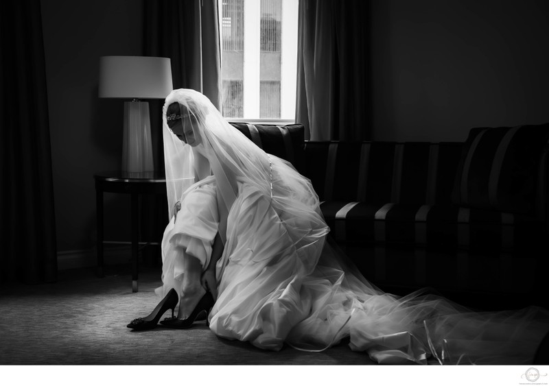 Bride with Veil Putting on Shoes: Toronto Photography