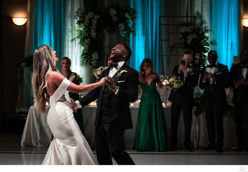 Interracial Couple Singing at First Dance